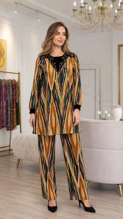 Full front view of model wearing Amber Multi embroidered tunic and pants matching set