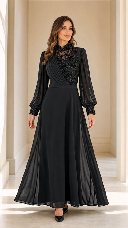 Front full-length view of black long sleeve beaded chiffon evening gown