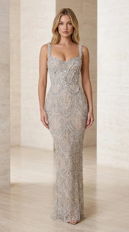 Front view of model wearing Silver beaded sweetheart neck column evening gown