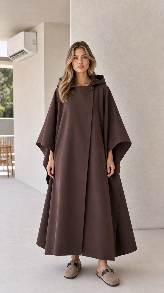Full front view of model wearing brown hooded maxi cape coat
