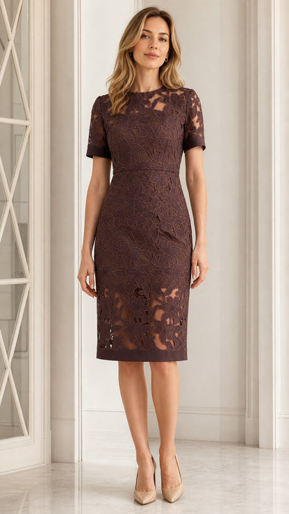 Front view of woman wearing plum floral lace sheath dress with short sleeves and illusion hem