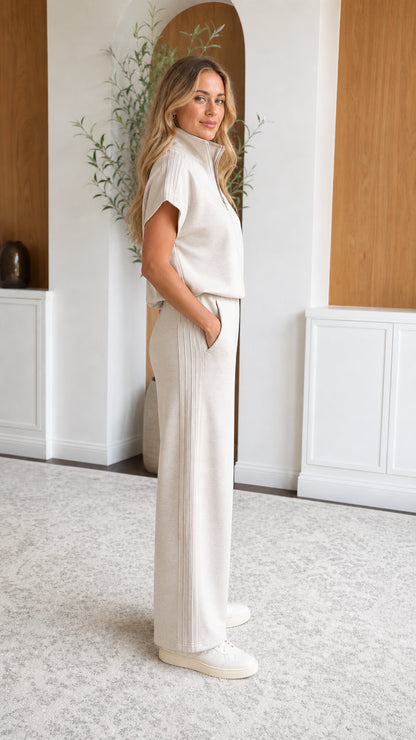 Side angle view of Oatmeal Beige two-piece matching lounge set