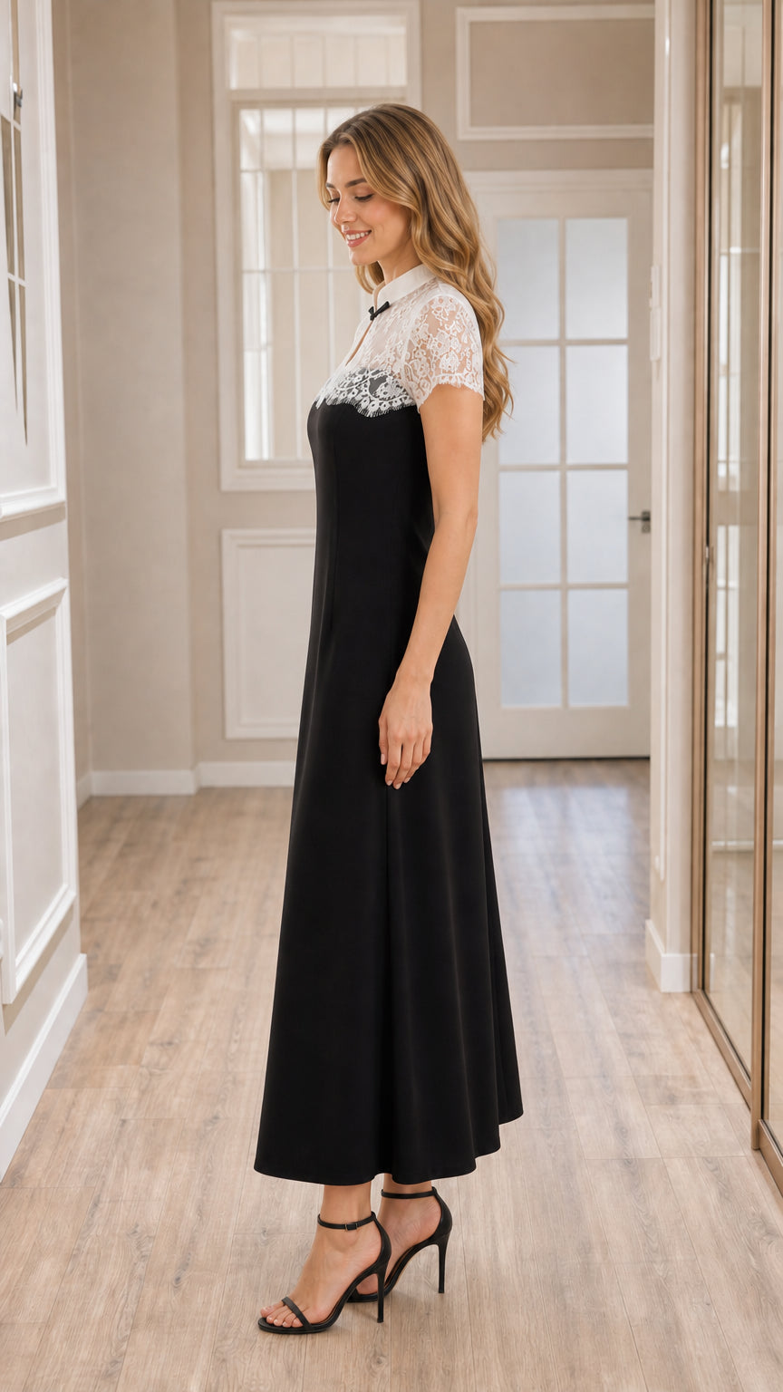 Side profile of model wearing black lace contrast evening maxi dress