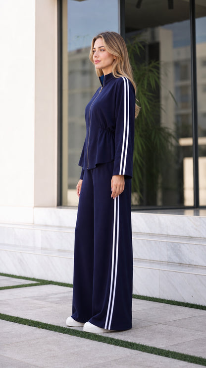 Side profile of women's navy blue wide-leg tracksuit set