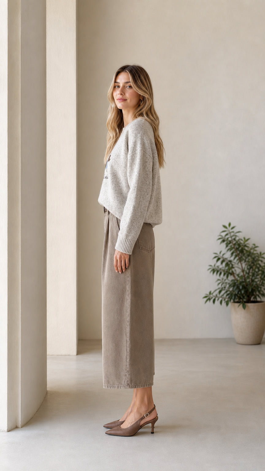 Side profile view of Heather Grey dachshund crewneck knit sweater