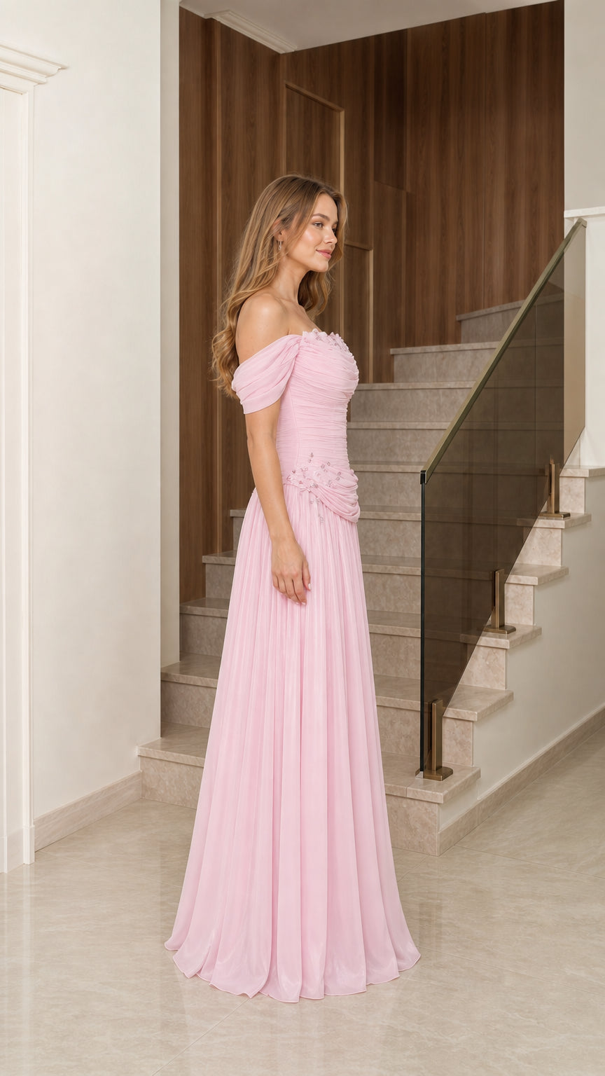 Side profile view of blush pink chiffon formal maxi dress