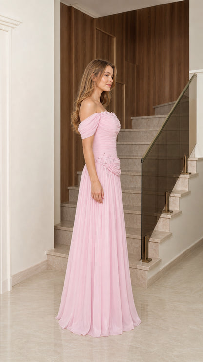 Side profile view of blush pink chiffon formal maxi dress