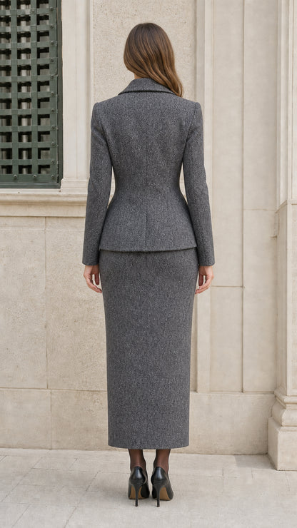 Back view of woman wearing Heather Grey fitted blazer and column maxi skirt