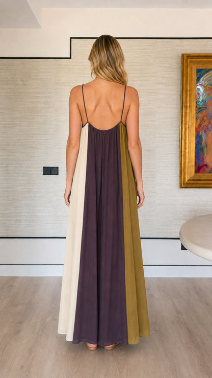 Back view showing the scoop back and slim straps of the color-block maxi dress