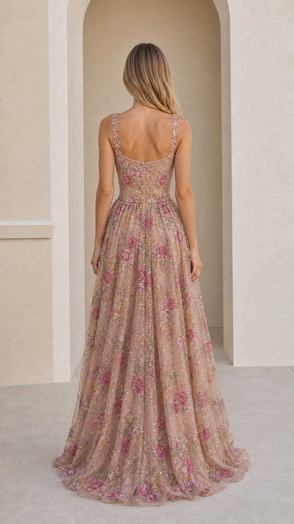 Back view of woman wearing Dusty Rose embroidered sleeveless gown with scoop back