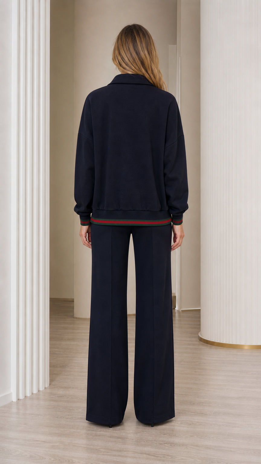 Back view of navy blue wide-leg lounge pants and zip collared jacket