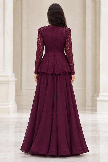 Back view of model in burgundy long sleeve peplum evening dress