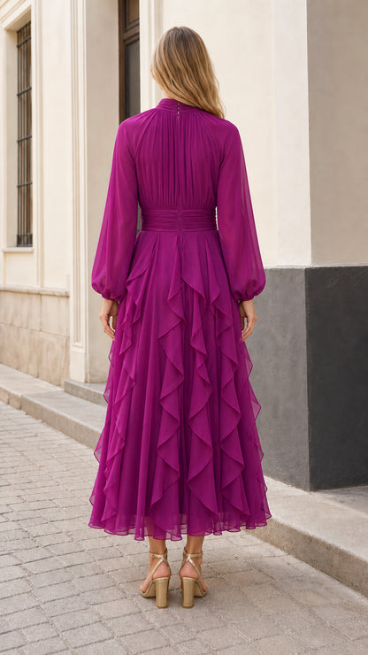 Back view of model showing the back neckline and flowing skirt of magenta maxi dress