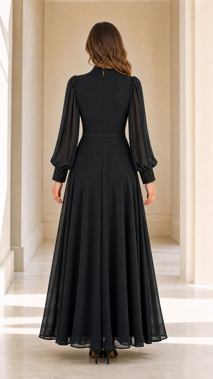 Back view of black floor length long sleeve evening maxi gown