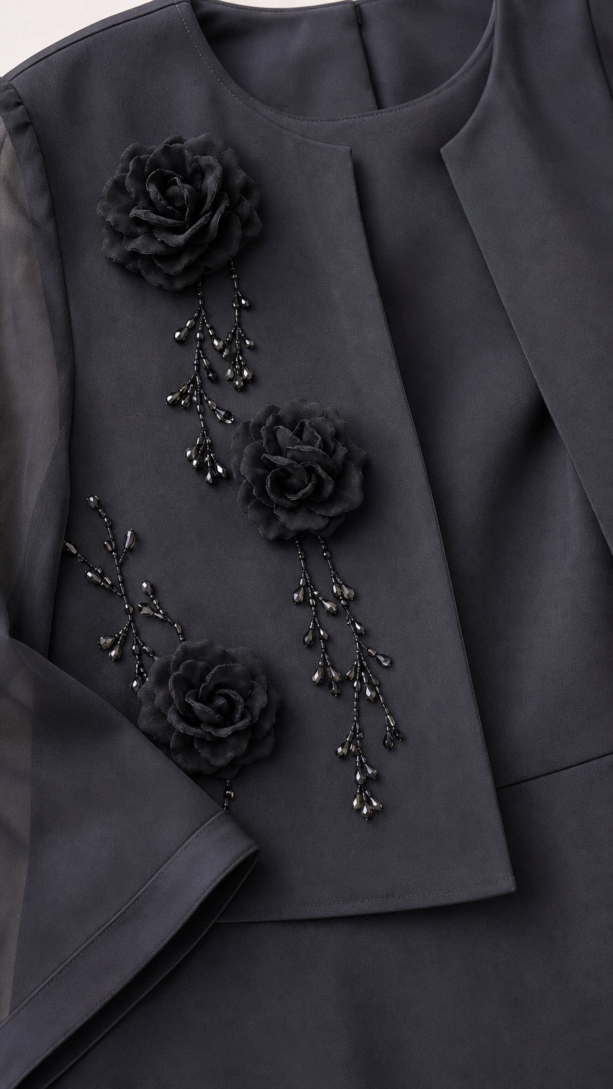 Close-up detail of Charcoal Grey 3D floral rosettes and delicate beaded stem embellishment