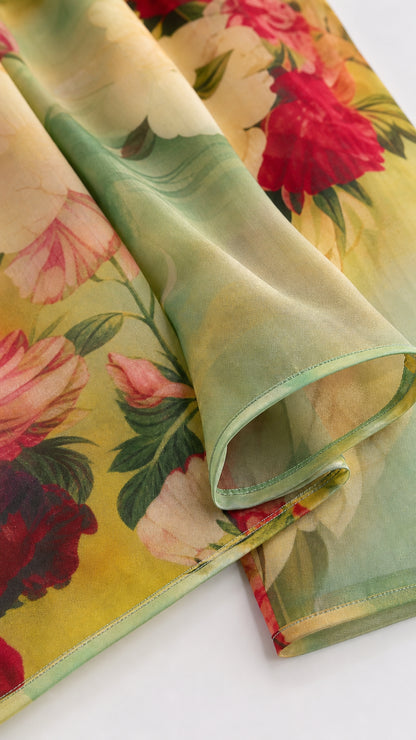 Close-up detail of lightweight sheer floral print fabric and fine hem stitching