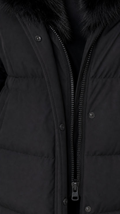 Close up of black winter coat zipper closure and snap button storm placket