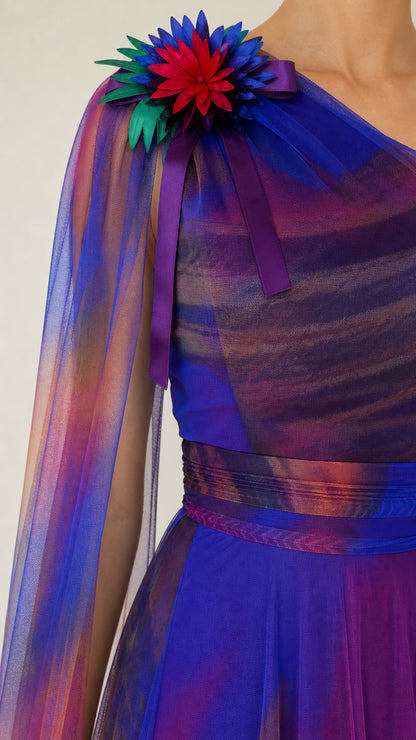 Close-up detail of 3D multicolor floral corsage on pleated one-shoulder bodice
