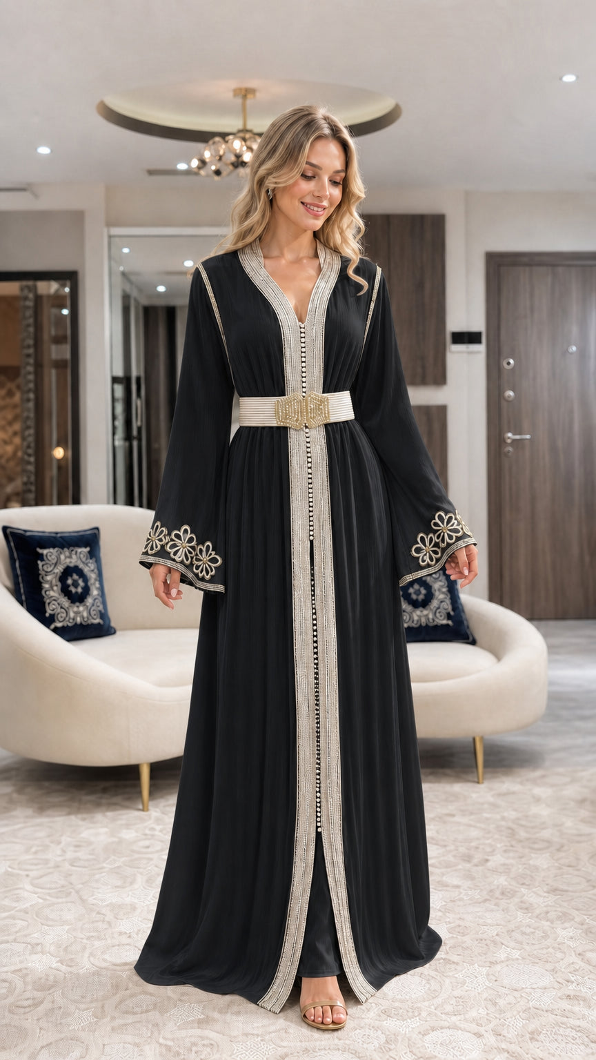 Front view of black pleated Moroccan caftan maxi dress with belt