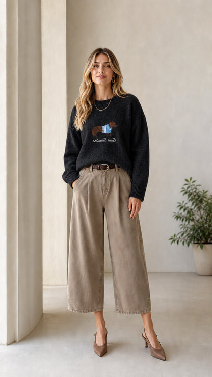 Model wearing Black dachshund graphic crewneck knit sweater