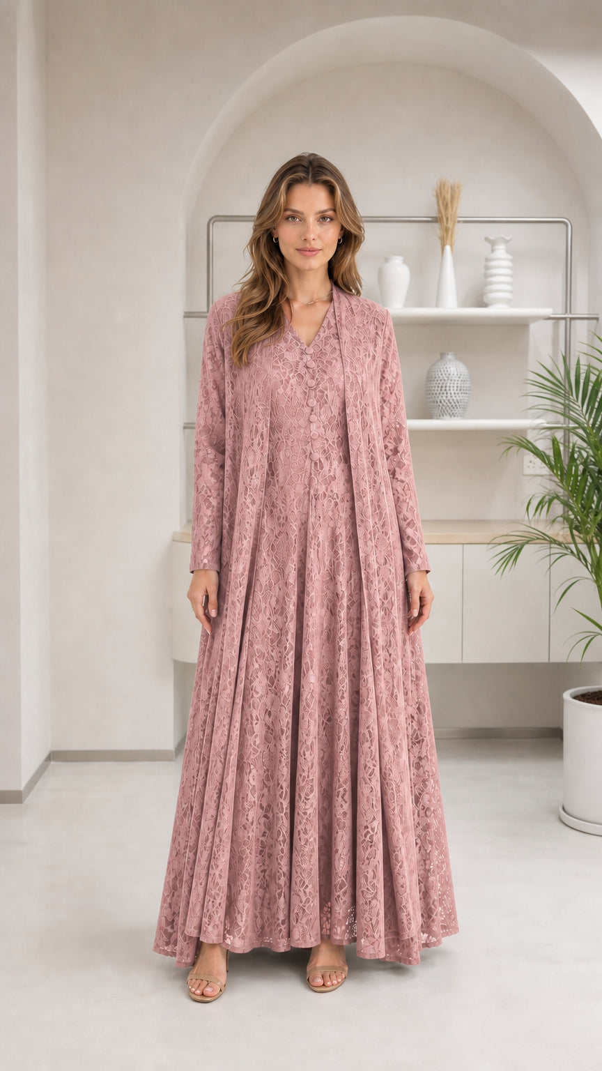 Front view of woman wearing dusty pink floral lace maxi dress set
