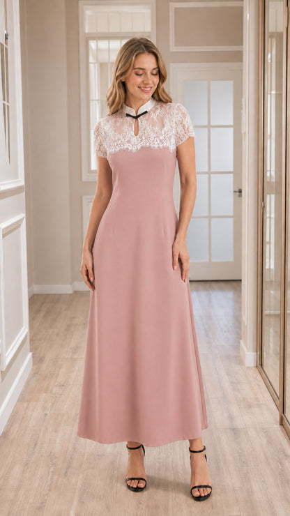 Front view of model wearing dusty pink lace yoke A-line maxi dress