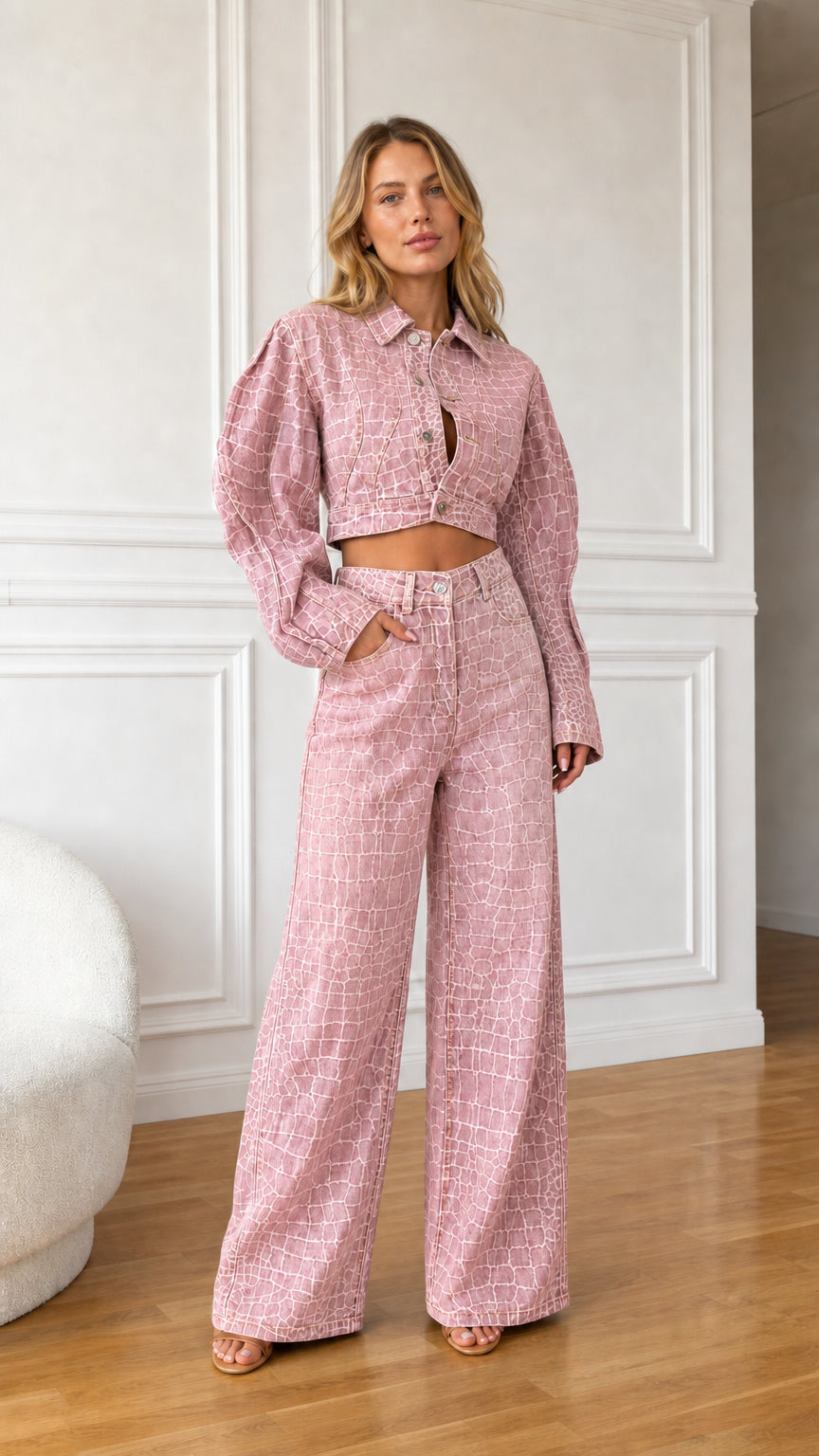 Model wearing dusty pink crocodile textured denim cropped jacket and wide leg pants set