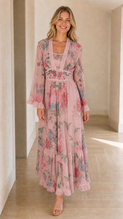 Full-length front view of pink blush floral long sleeve tiered maxi dress