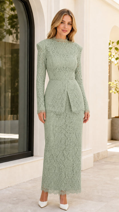 Front view of woman wearing sage green long sleeve lace peplum maxi dress
