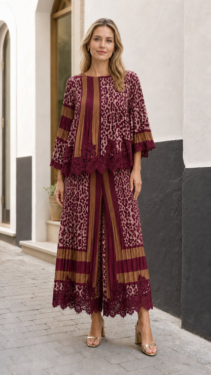 Full front view of model wearing the burgundy red pleated leopard two-piece set