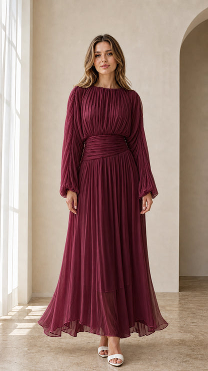 Model wearing burgundy wine long sleeve pleated maxi dress
