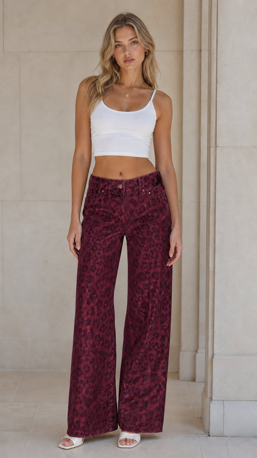 Front view of woman wearing Burgundy wine leopard print wide leg pants