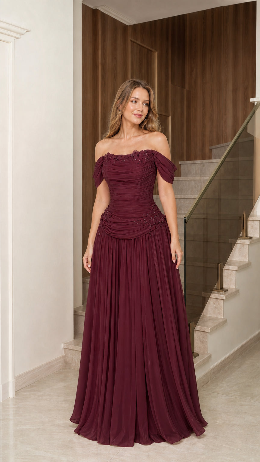 Front full-length view of burgundy red off-the-shoulder formal maxi gown