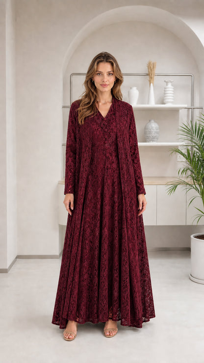 Front view of woman wearing burgundy floral lace maxi dress set