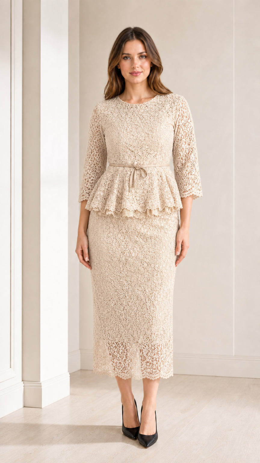 Front view of woman wearing champagne beige lace peplum midi dress