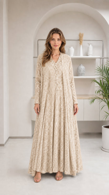 Front view of woman wearing beige cream floral lace maxi dress set