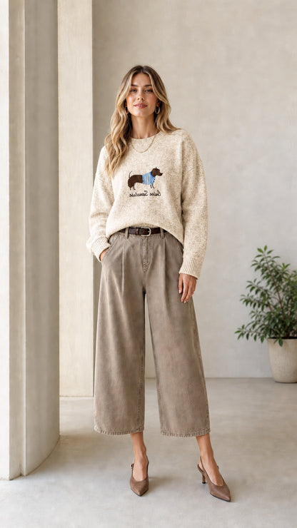 Model wearing Cream dachshund graphic crewneck knit sweater
