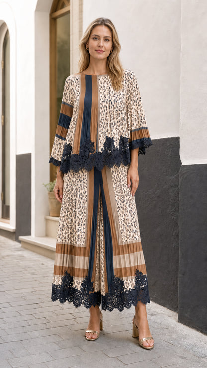 Full front view of model wearing the beige tan and navy pleated leopard two-piece set